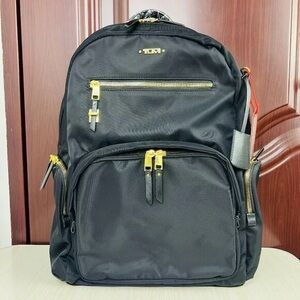 TUMI Black and Gold Backpack